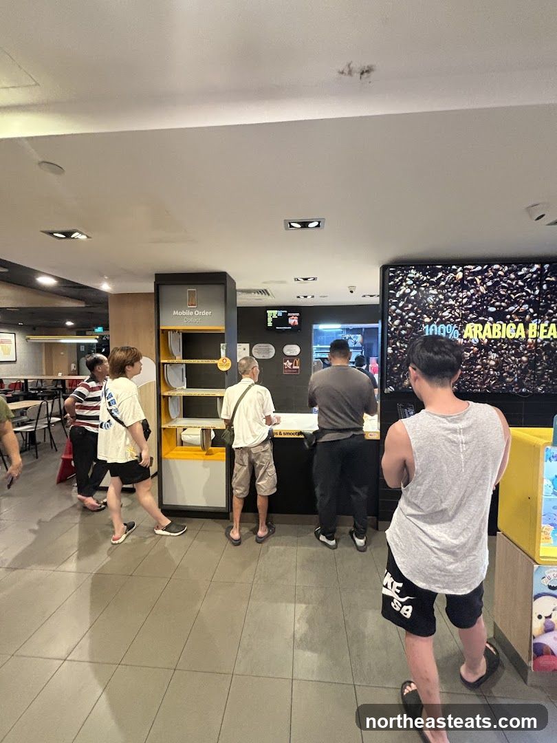 People queuing at a counter