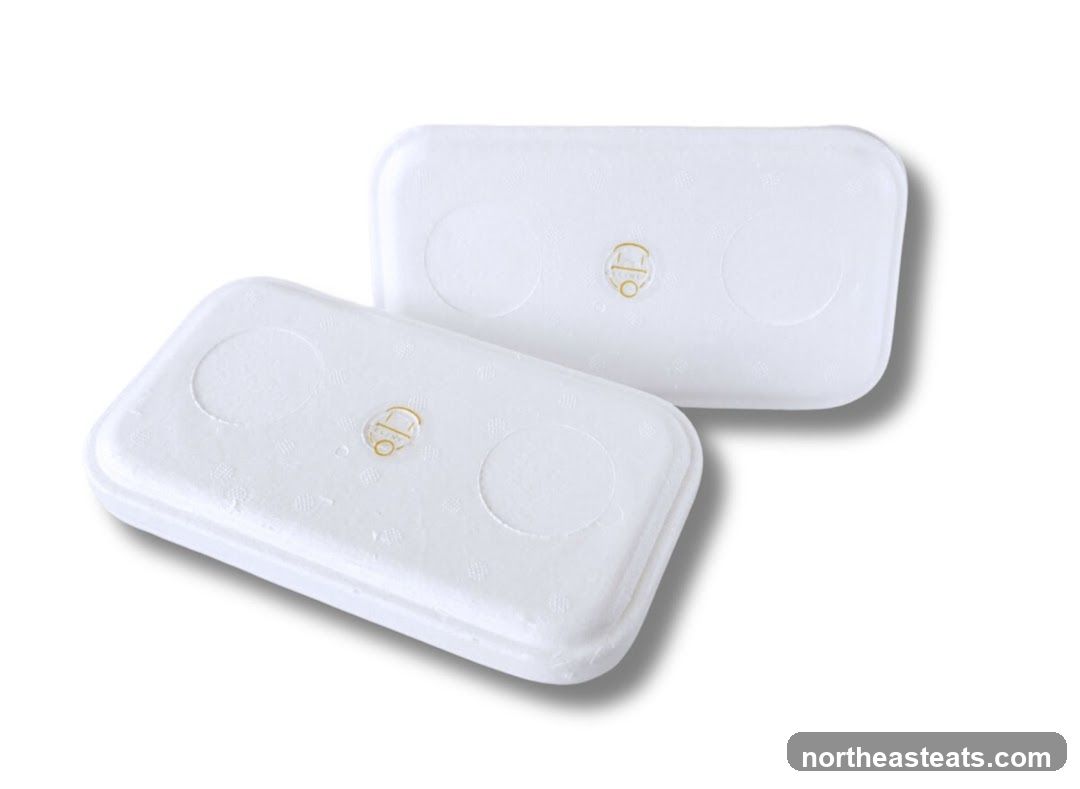 Two white food containers