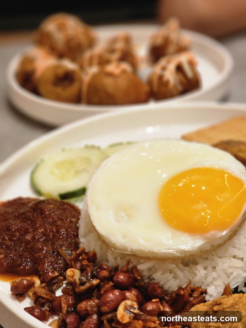Nasi Lemak with Fried Egg and Side Dishes