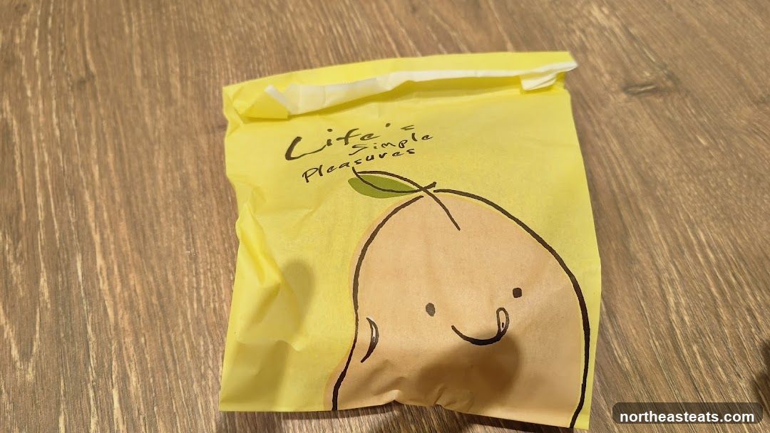 Yellow packaging with fruit illustration