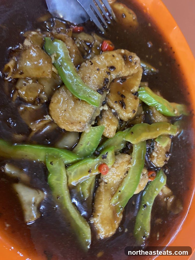 Stir-fried dish with fish and vegetables