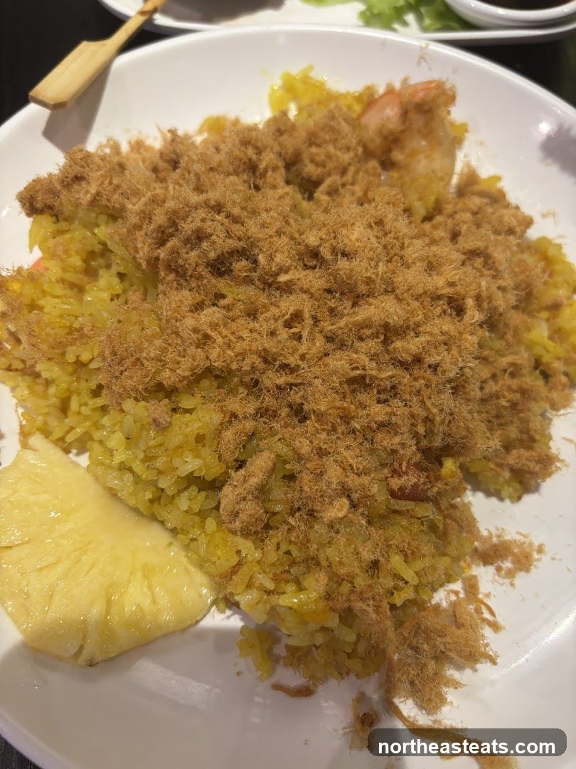 Rice dish with shredded meat and pineapple