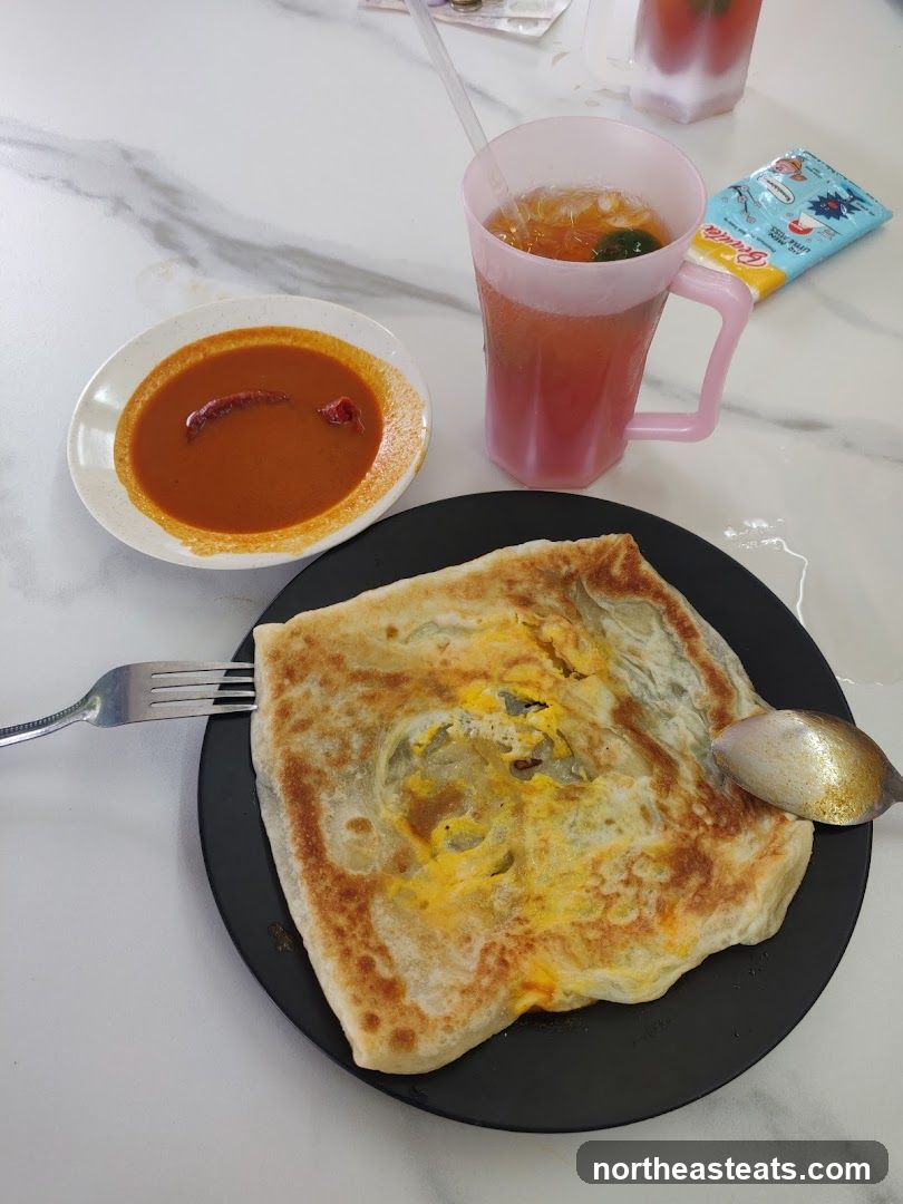 Roti Canai with Curry and Drink
