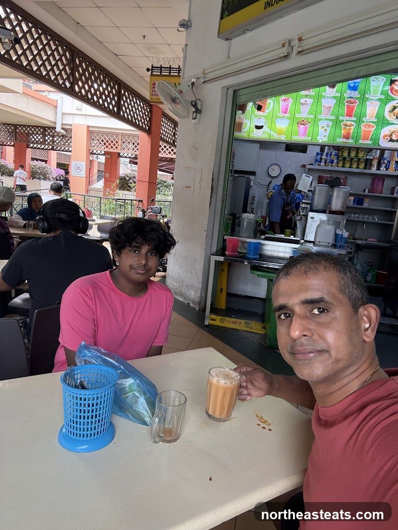 People at an outdoor food stall