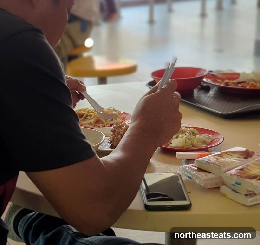 Person eating at a table