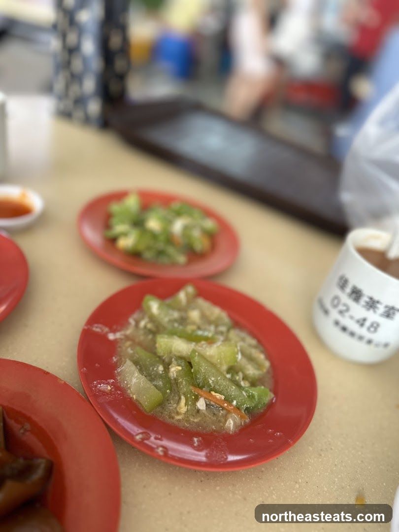 Stir-fried vegetables on red plates