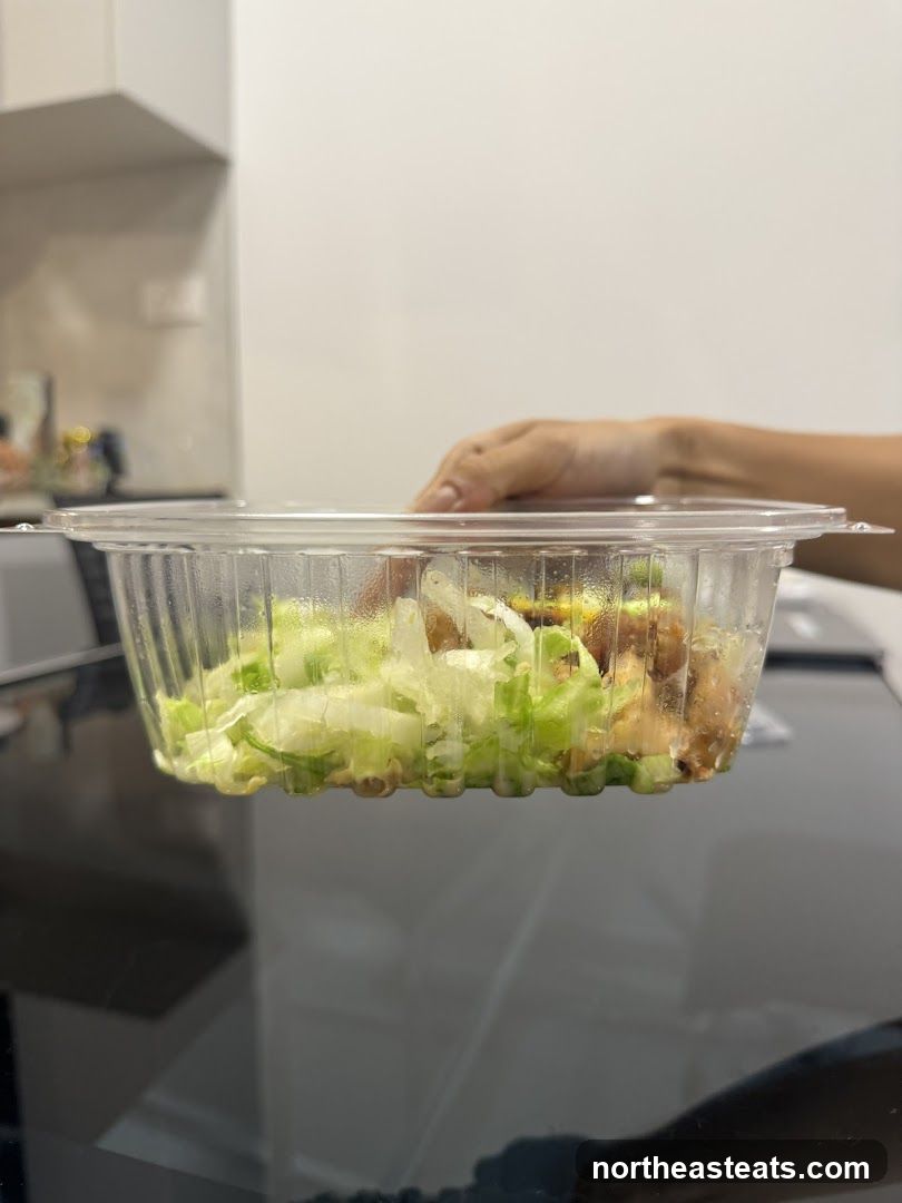 Salad in a plastic container
