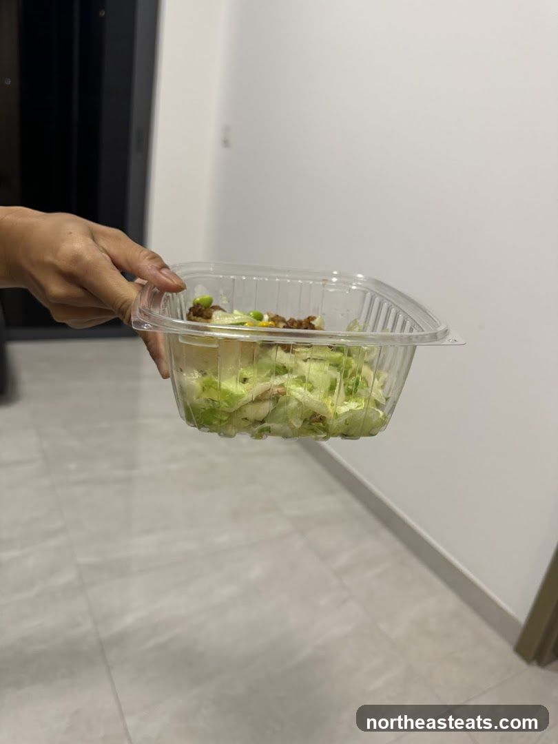 Salad in a plastic container