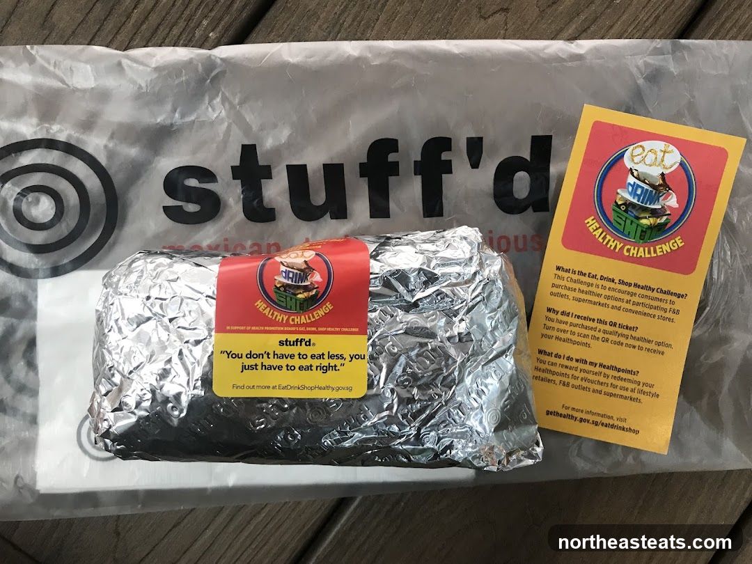 Food wrapped in foil with promotional material