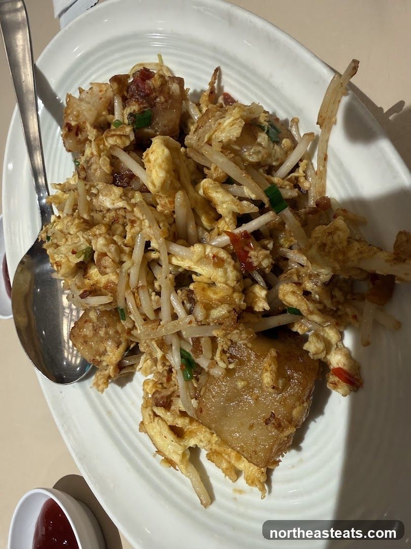 Fried Turnip Cake with Eggs and Bean Sprouts