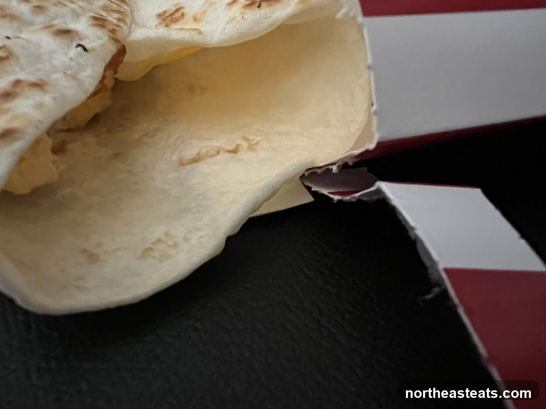 Close-up of a wrap in a red and white striped container