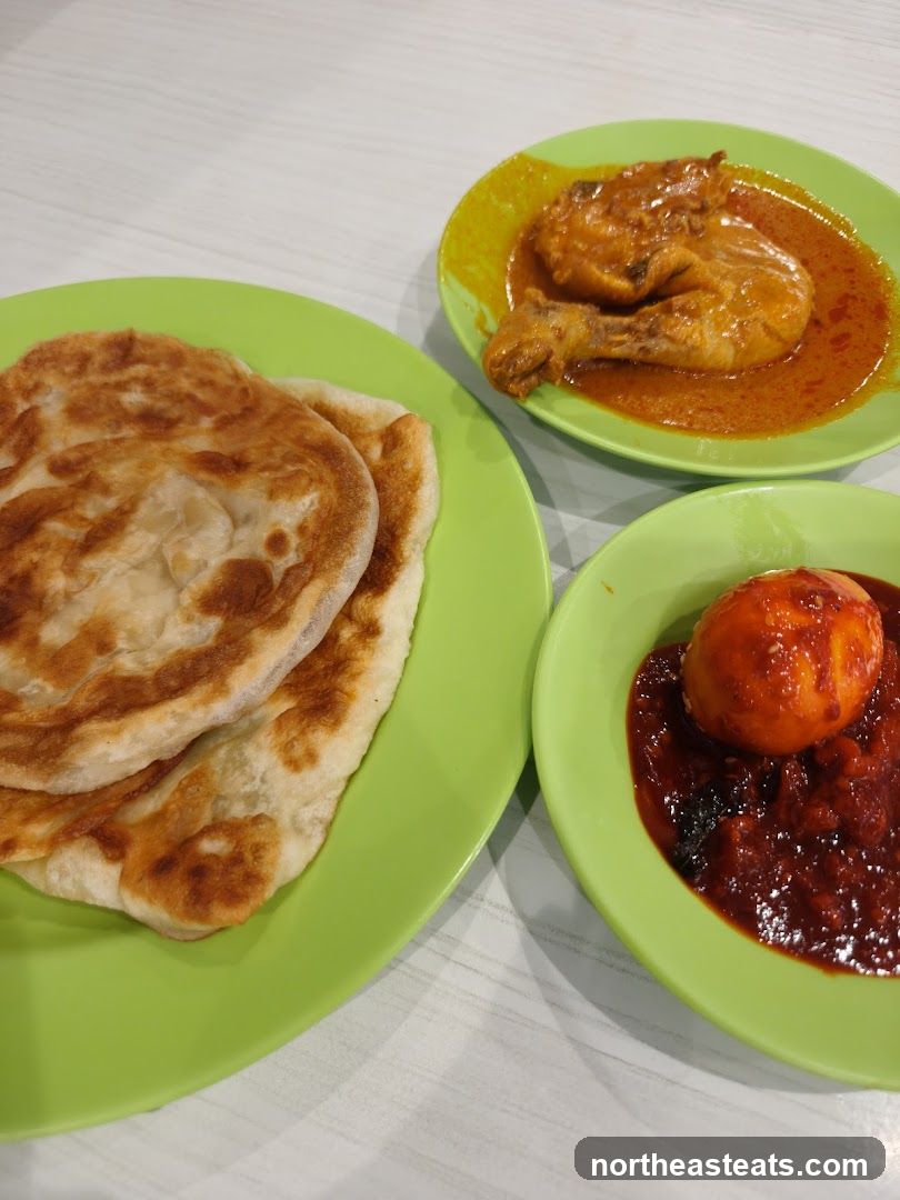 Roti Canai with Chicken Curry and Sambal Egg
