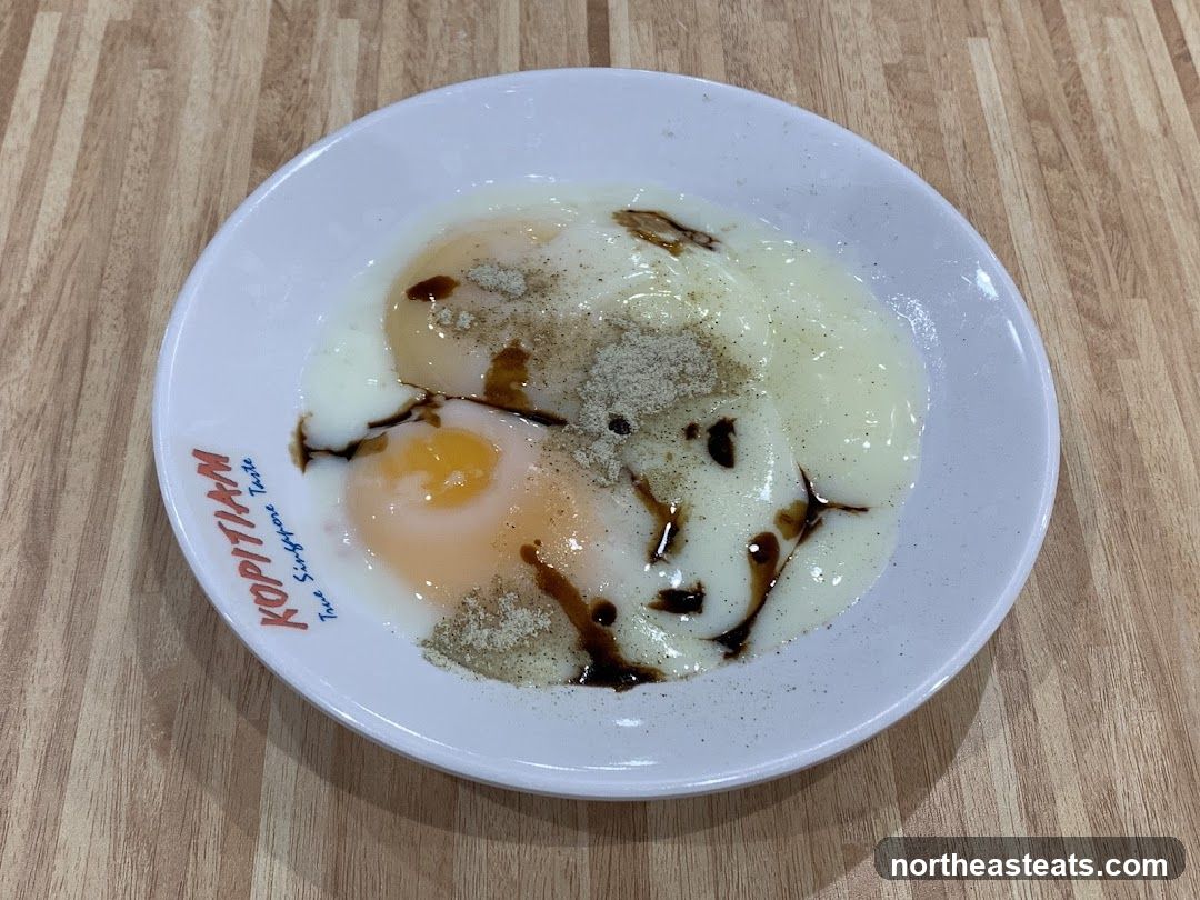 Soft-boiled eggs with soy sauce and pepper
