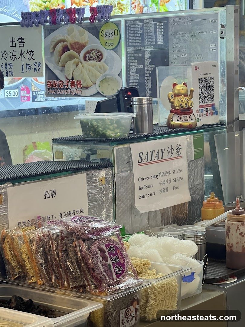 Food stall with menu and ingredients