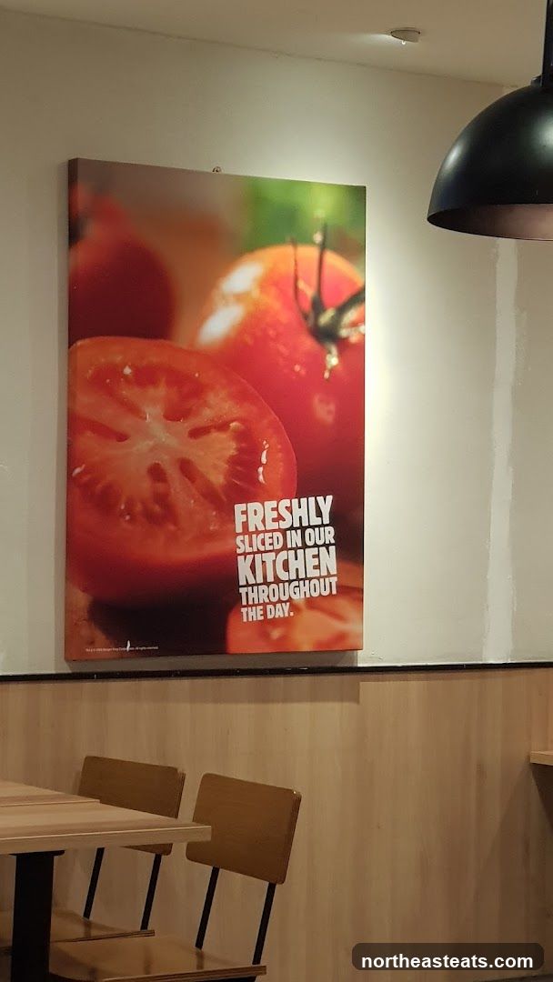Freshly Sliced Tomatoes Advertisement