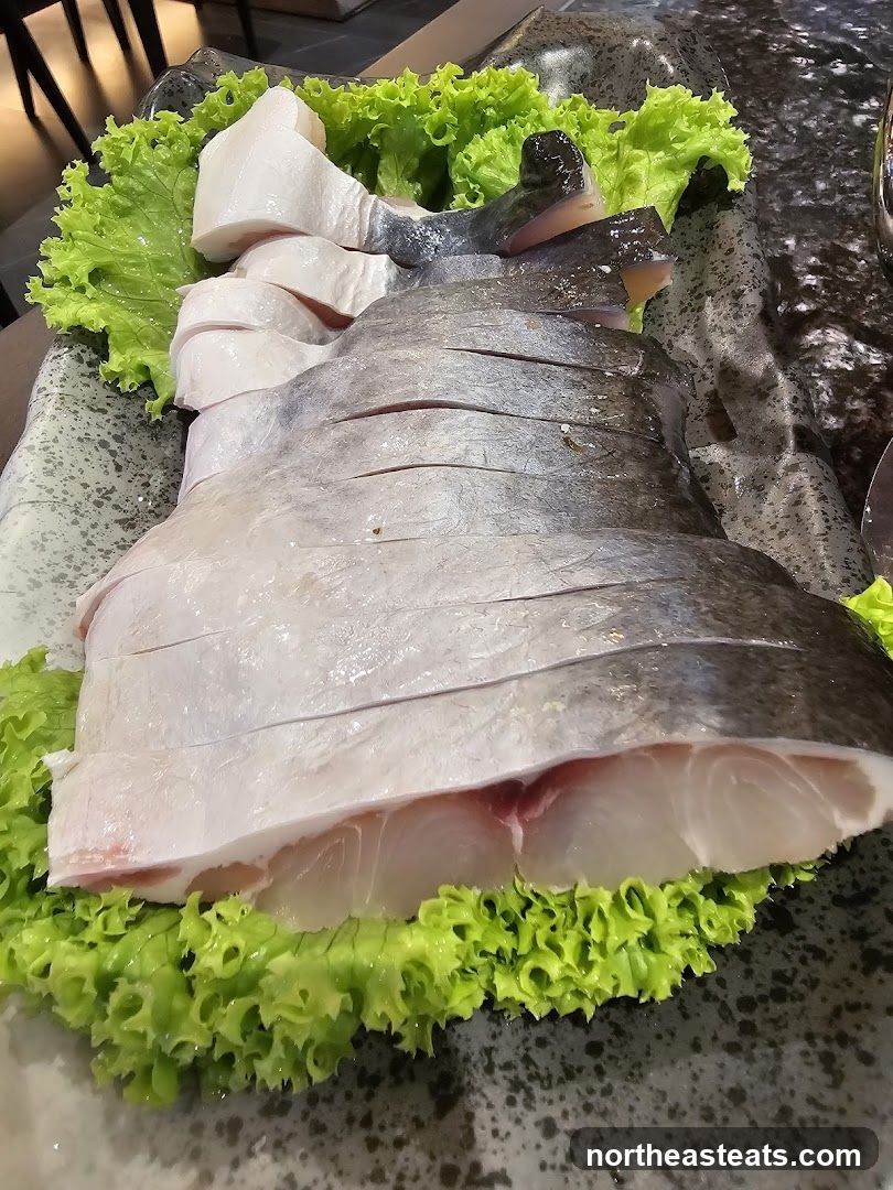 Sliced Raw Fish on Lettuce