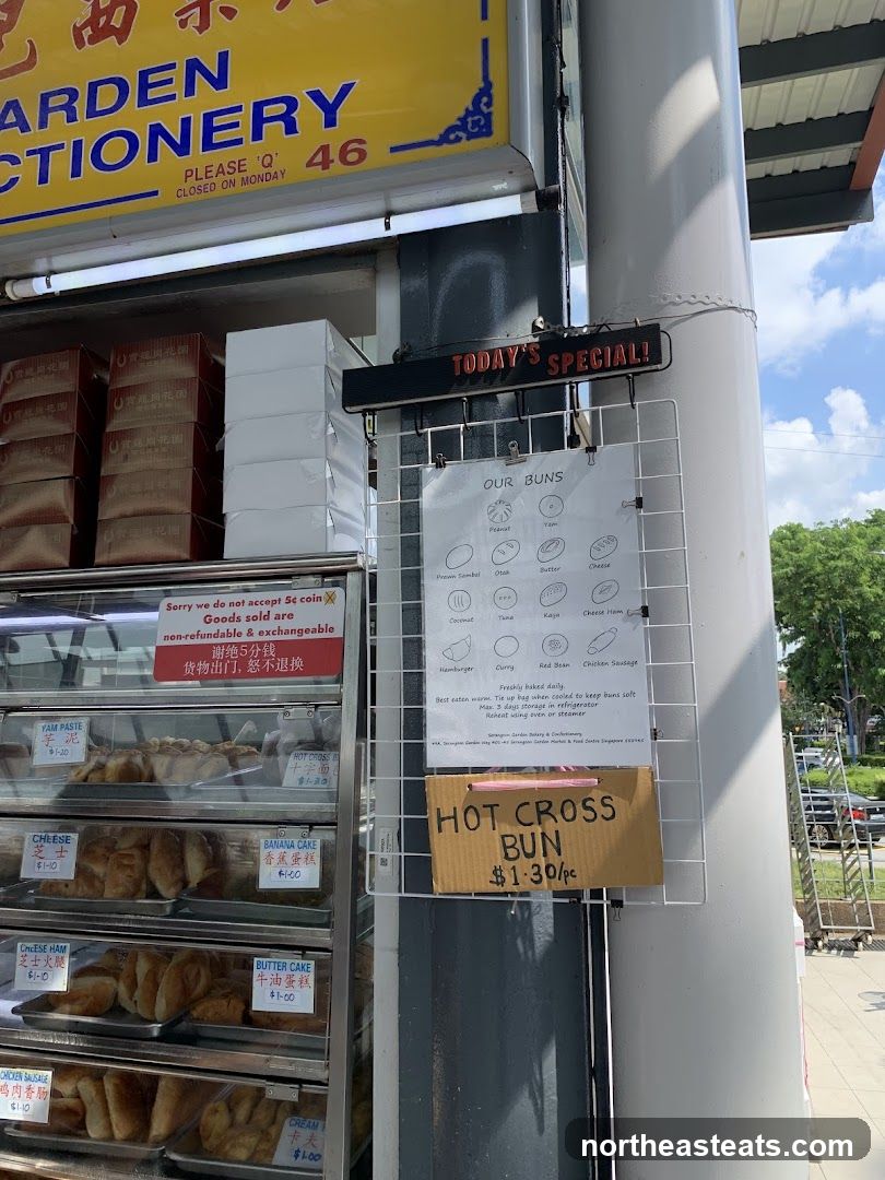 Bakery Display with Buns and Signage