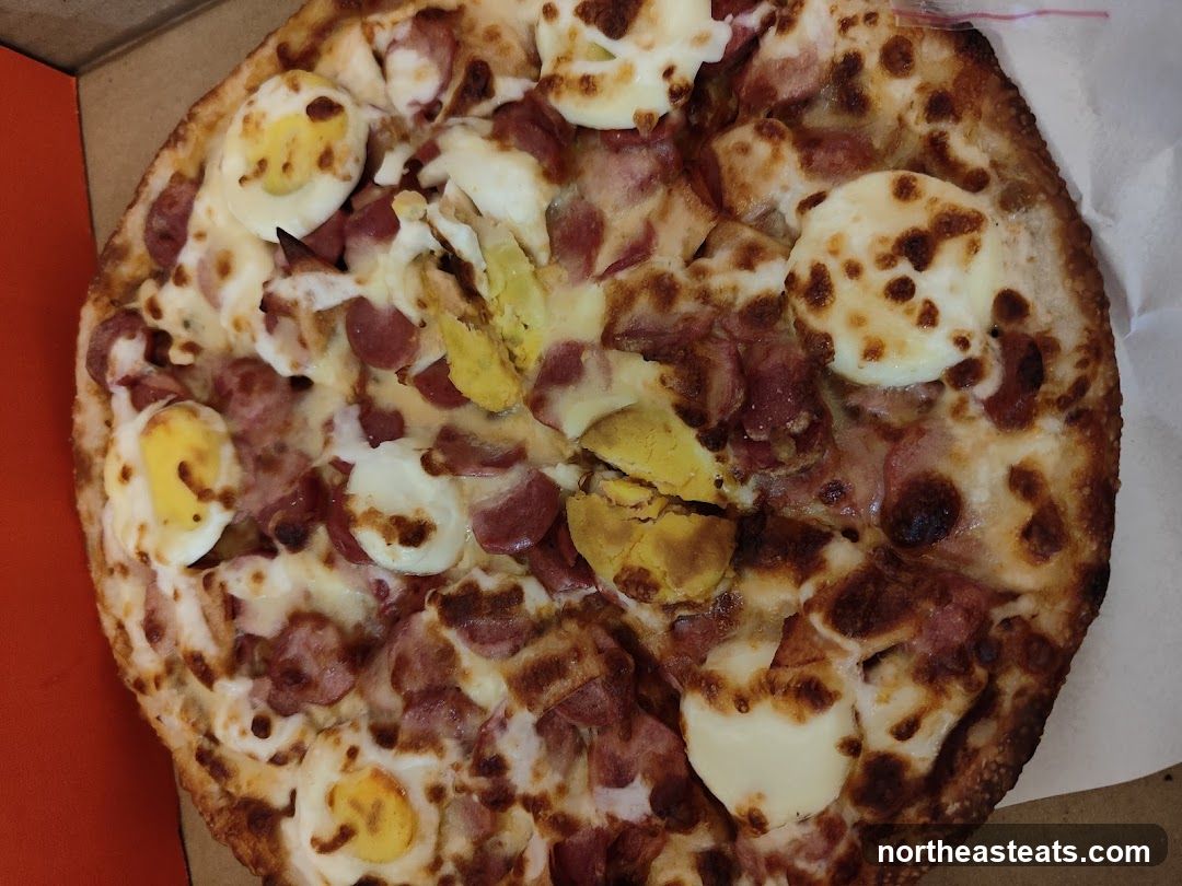 Pizza with Eggs and Sausage