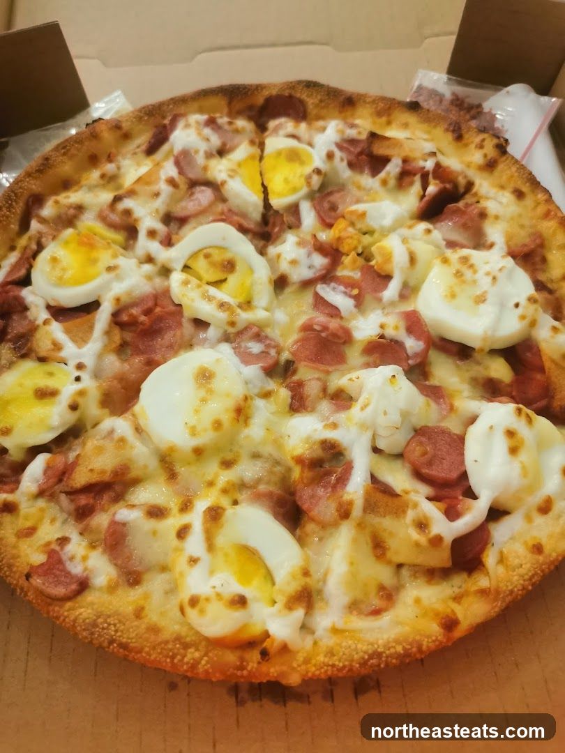 Pizza with Eggs and Sausage