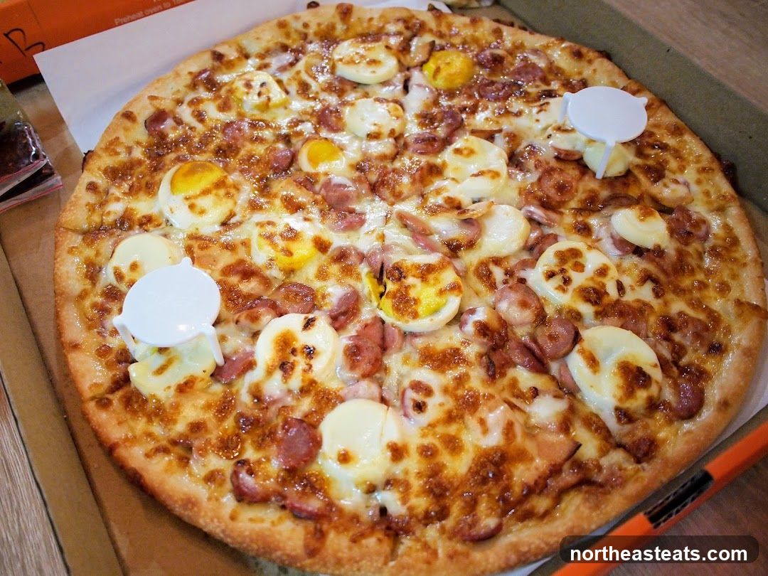 Pizza with Eggs and Sausage