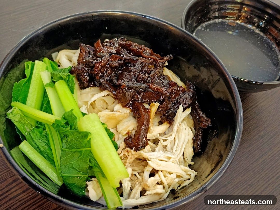 Noodles with Shredded Chicken and Dark Sauce