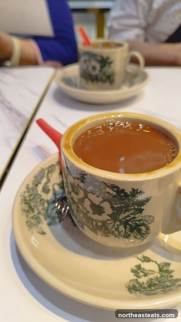 Two cups of coffee on saucers