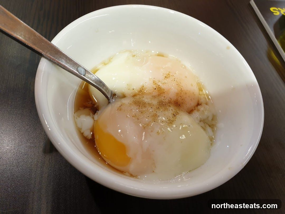 Soft-boiled eggs with soy sauce and pepper