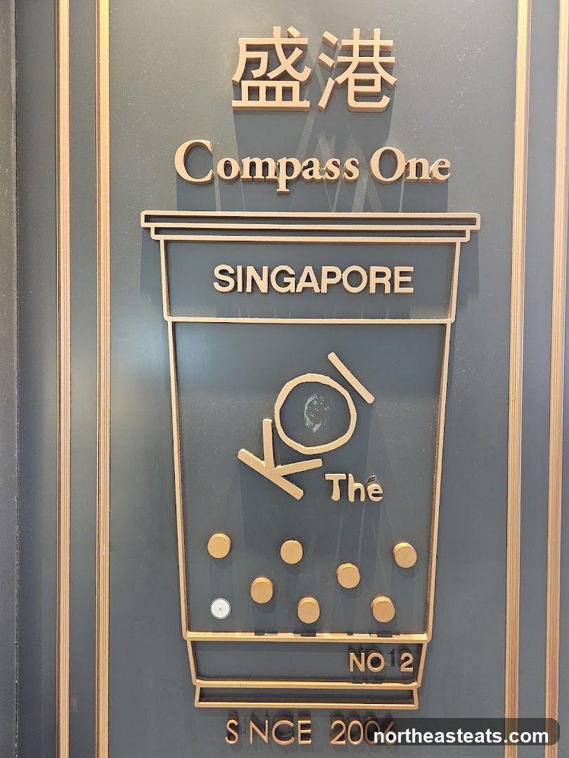 Koi The Singapore Compass One Sign