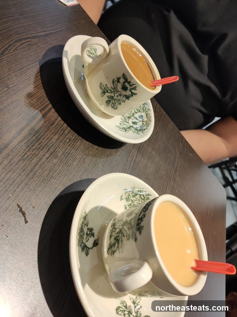 Two cups of tea on saucers