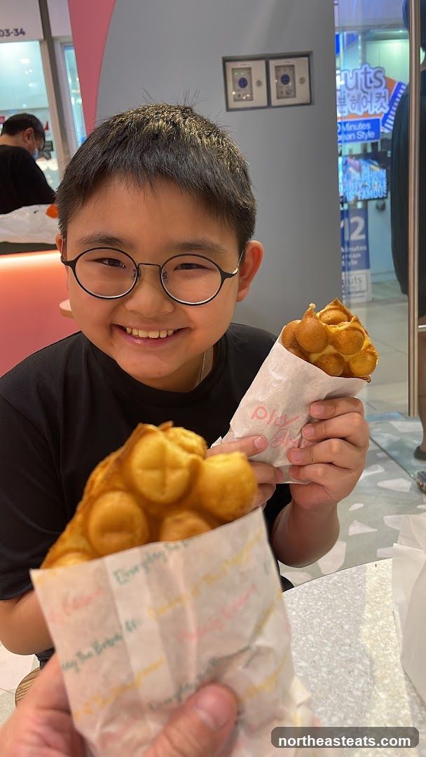 Boy with bubble waffles