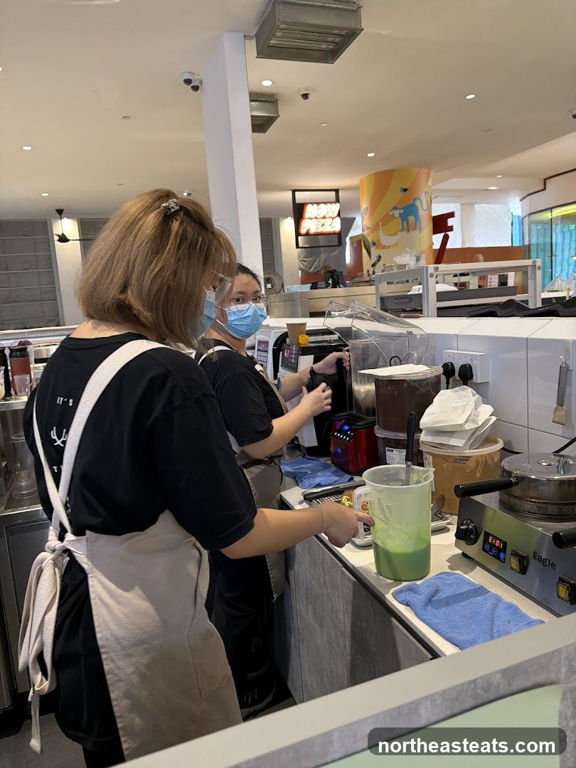 Staff preparing drinks