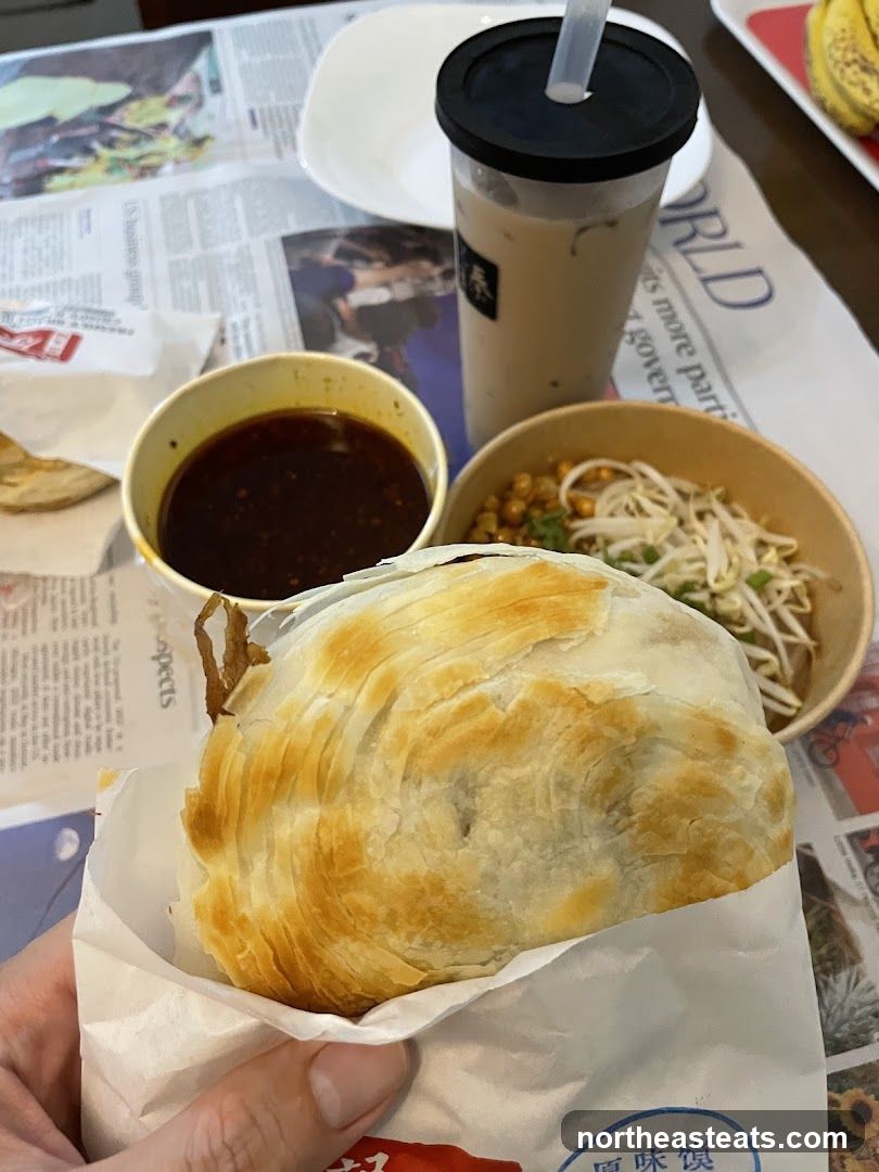 Savory Pastry with Dipping Sauce and Drink