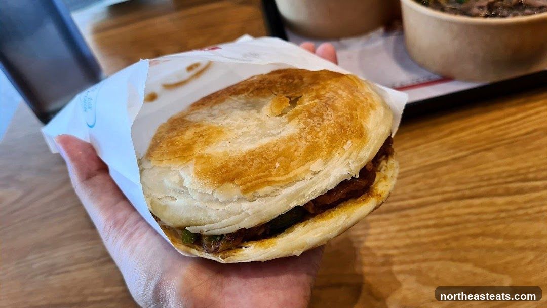 Close-up of a Roujiamo sandwich