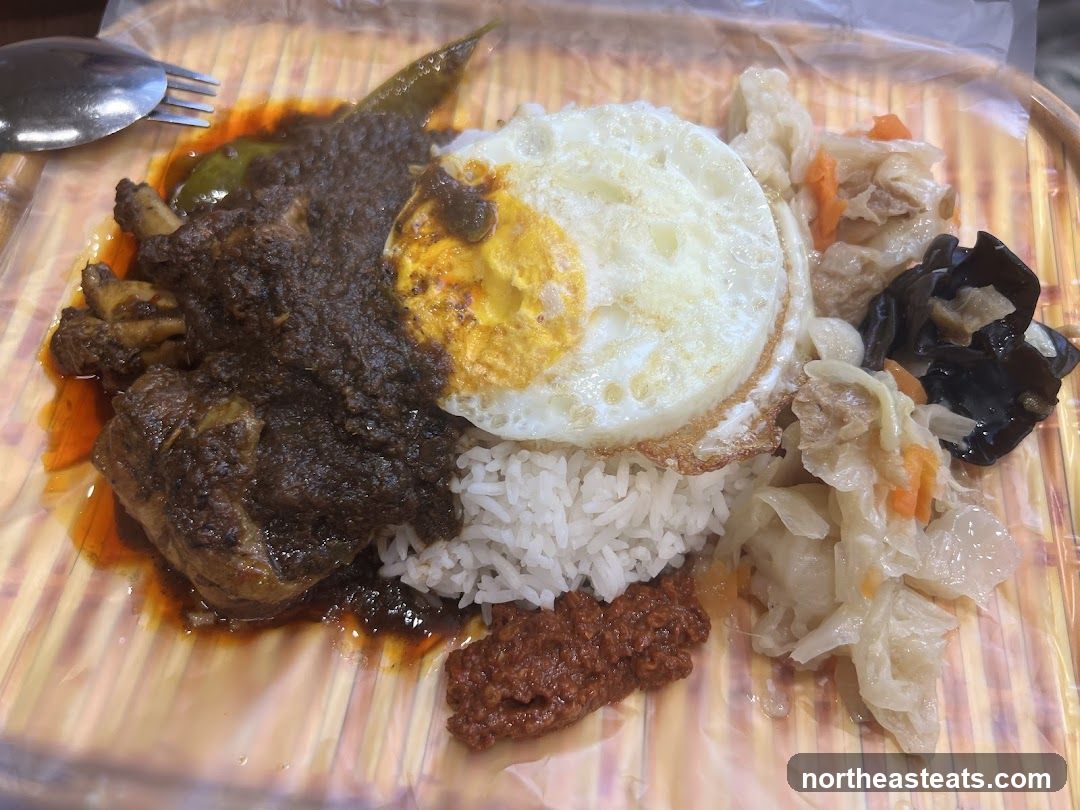 Chicken Rice with Fried Egg and Pickles