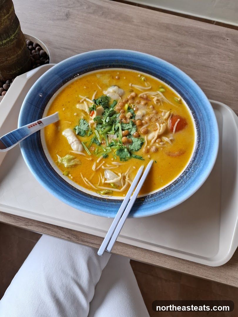 Bowl of Soup with Noodles and Vegetables