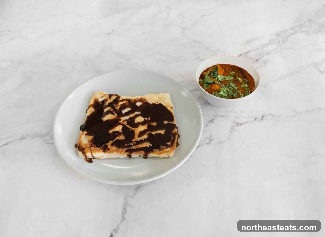 Roti with Chocolate Sauce and Curry