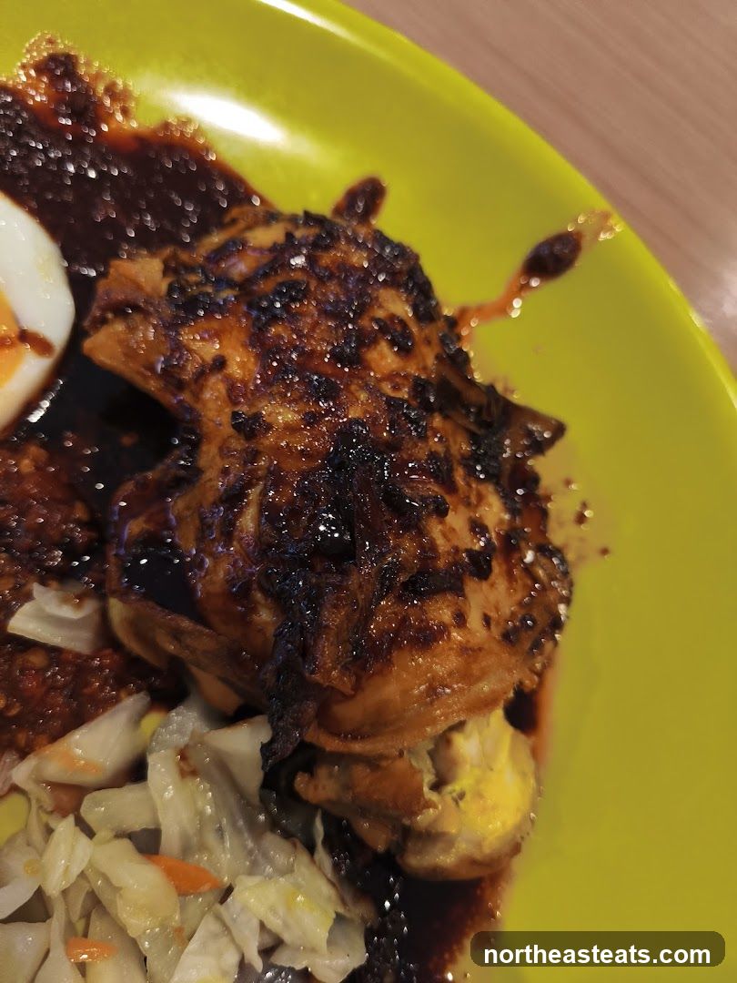 Chicken dish with egg and salad