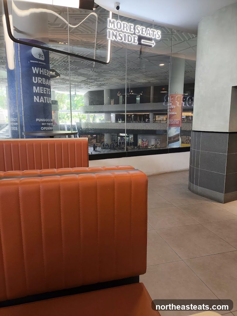 Interior seating area with view of mall