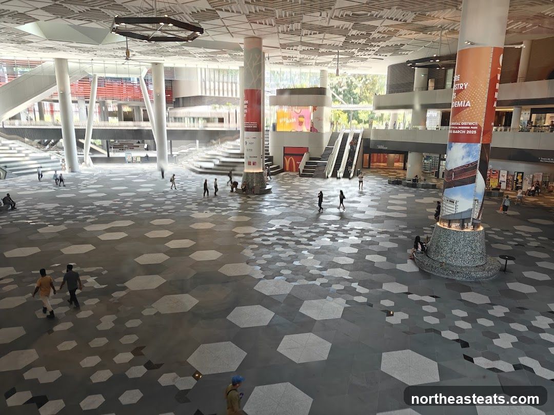 Modern Atrium with People and Advertisements