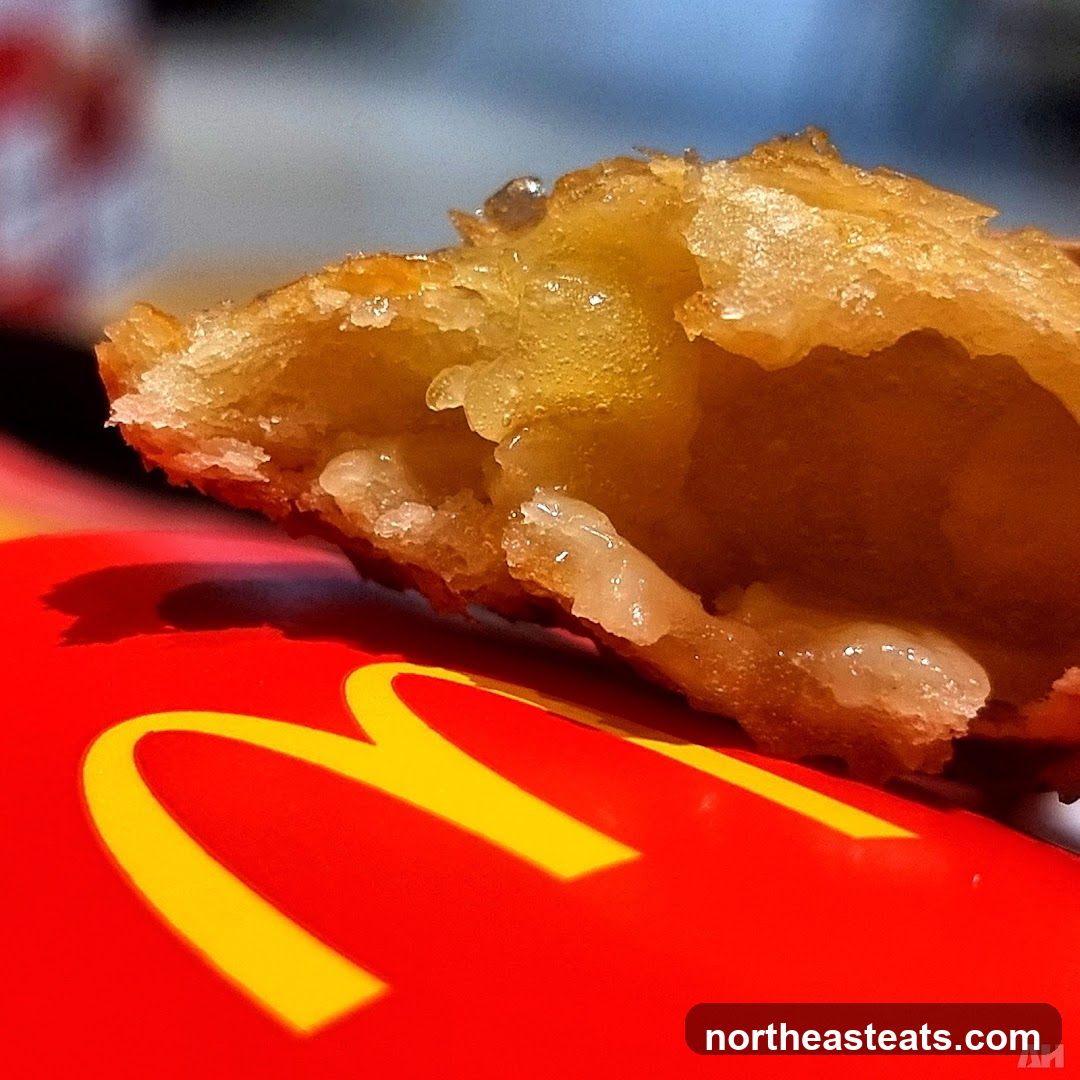 Close-up of a fried pastry on McDonald's packaging