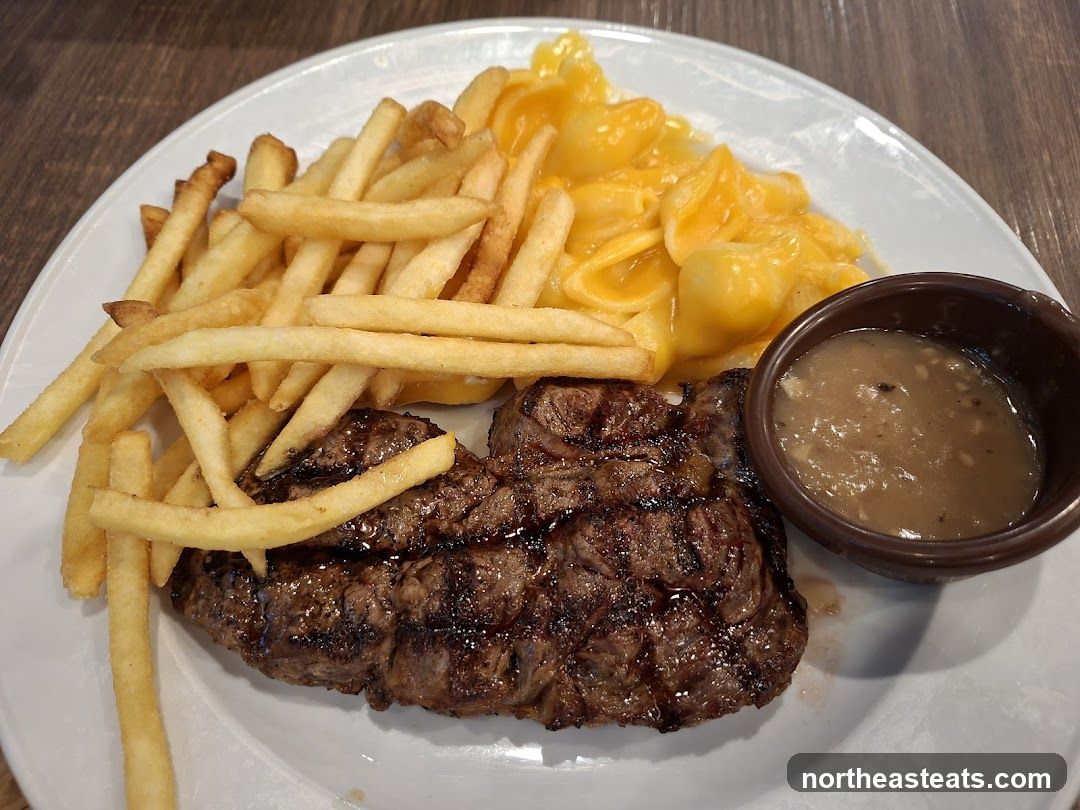 Steak with Fries and Macaroni and Cheese