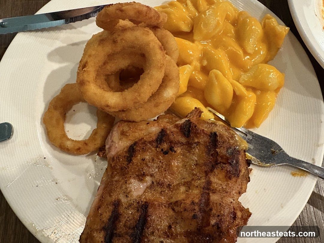 Grilled Meat with Onion Rings and Macaroni and Cheese