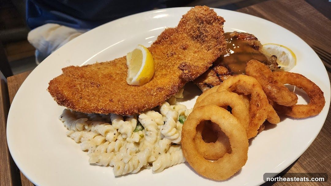 Breaded Schnitzel with Pasta and Onion Rings