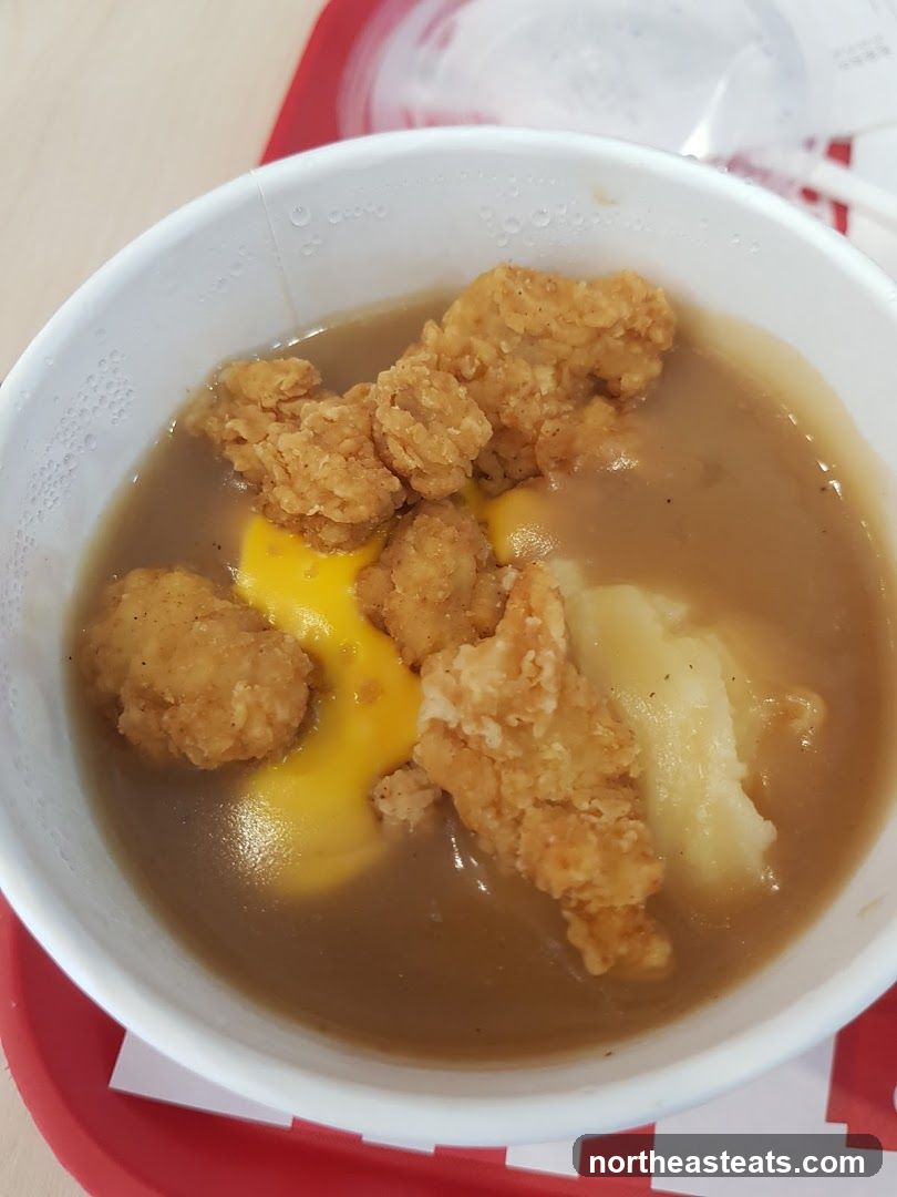 Chicken and Mashed Potatoes with Gravy and Cheese