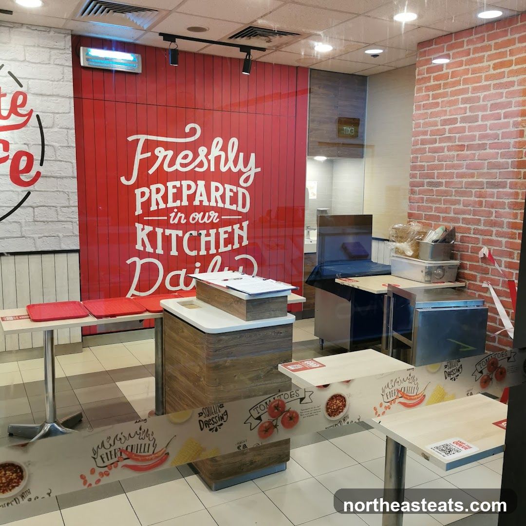 Restaurant Interior with "Freshly Prepared" Signage