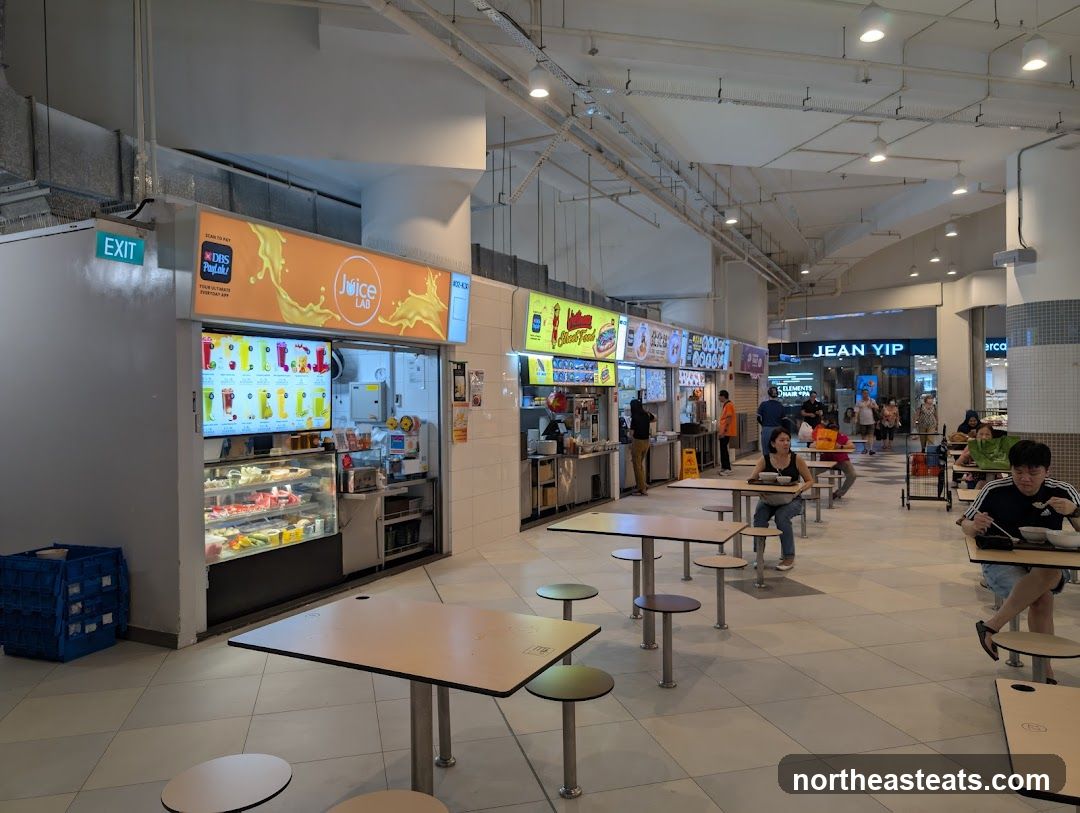 Food court with various stalls and seating