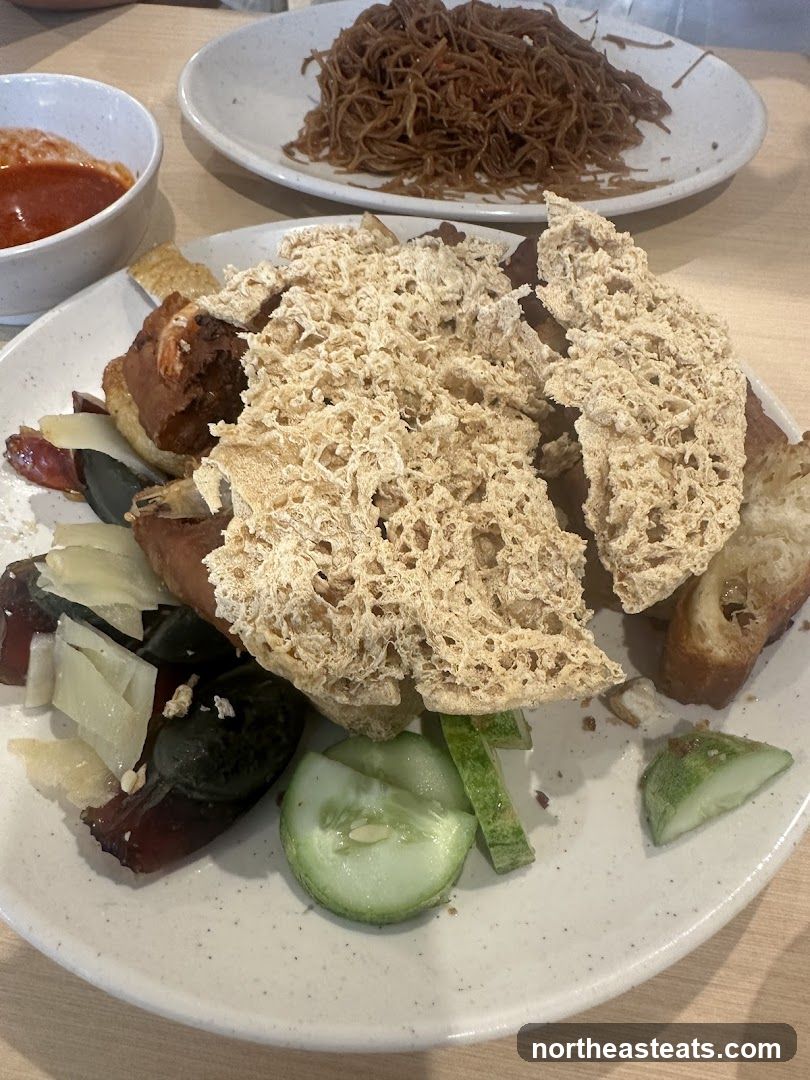 Platter of food with noodles and dipping sauce