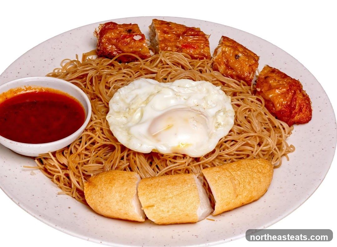 Noodles with Fried Egg and Fish Cakes