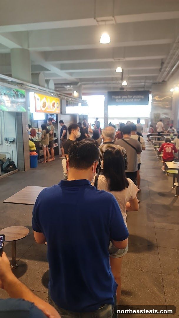 Food court with people queuing