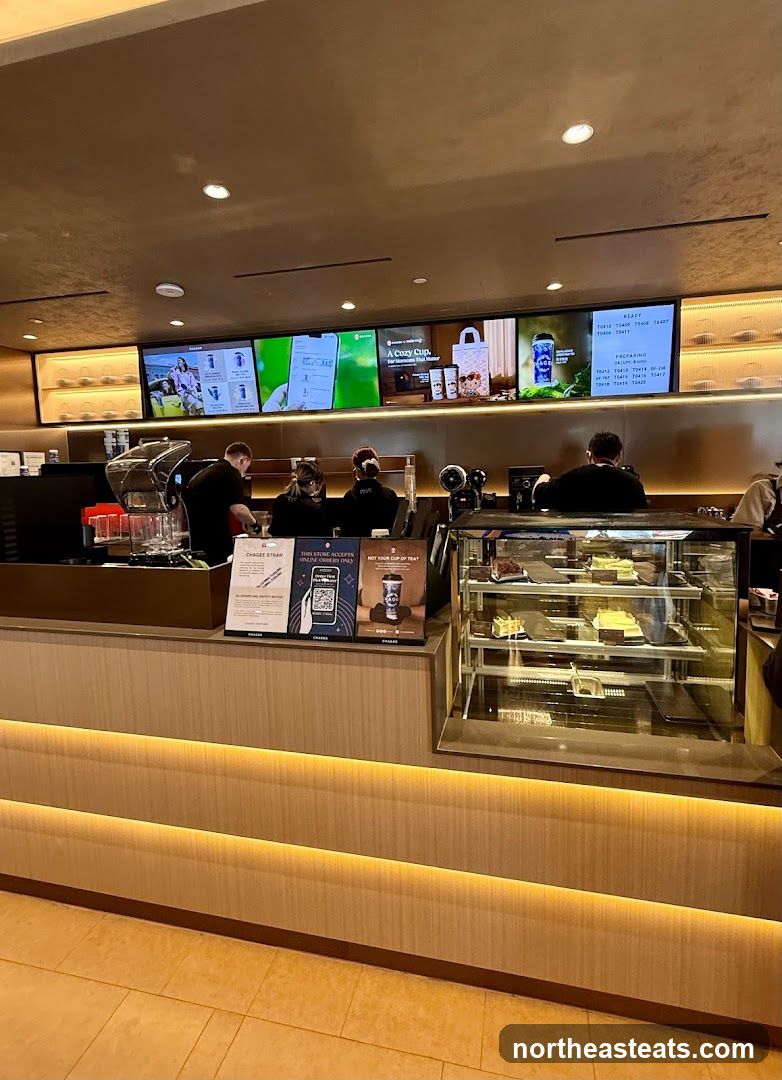 Cafe Counter with Digital Menu and Pastries